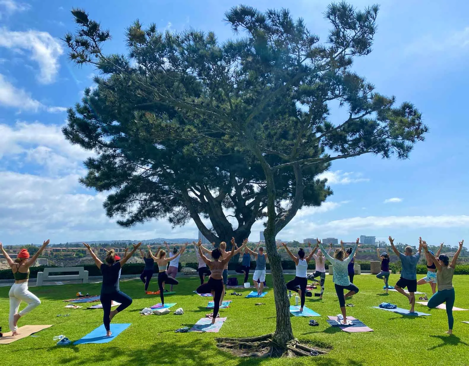 Outdoor yoga class at Galaxy View Park in Newport Beach by GLXYOGA
